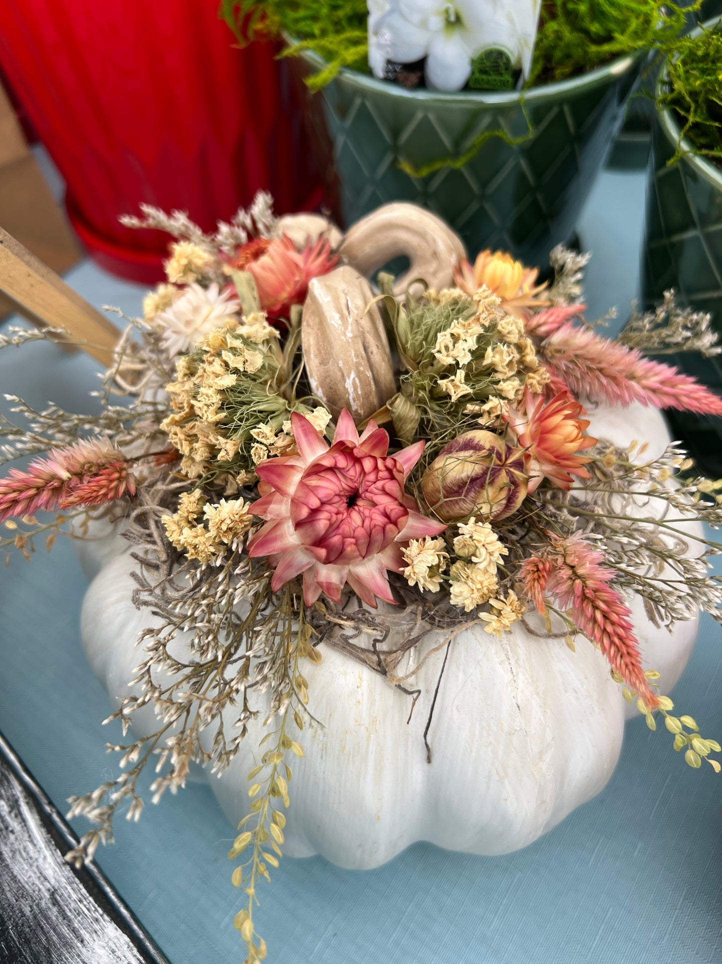 Resin pumpkin with everlasting flowers